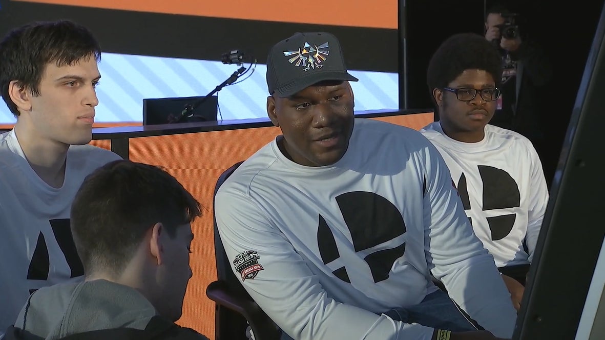 John Numbers (left), DTFaux (center), and Seth (right) planning their strategy as team Northeast during the tournament. 