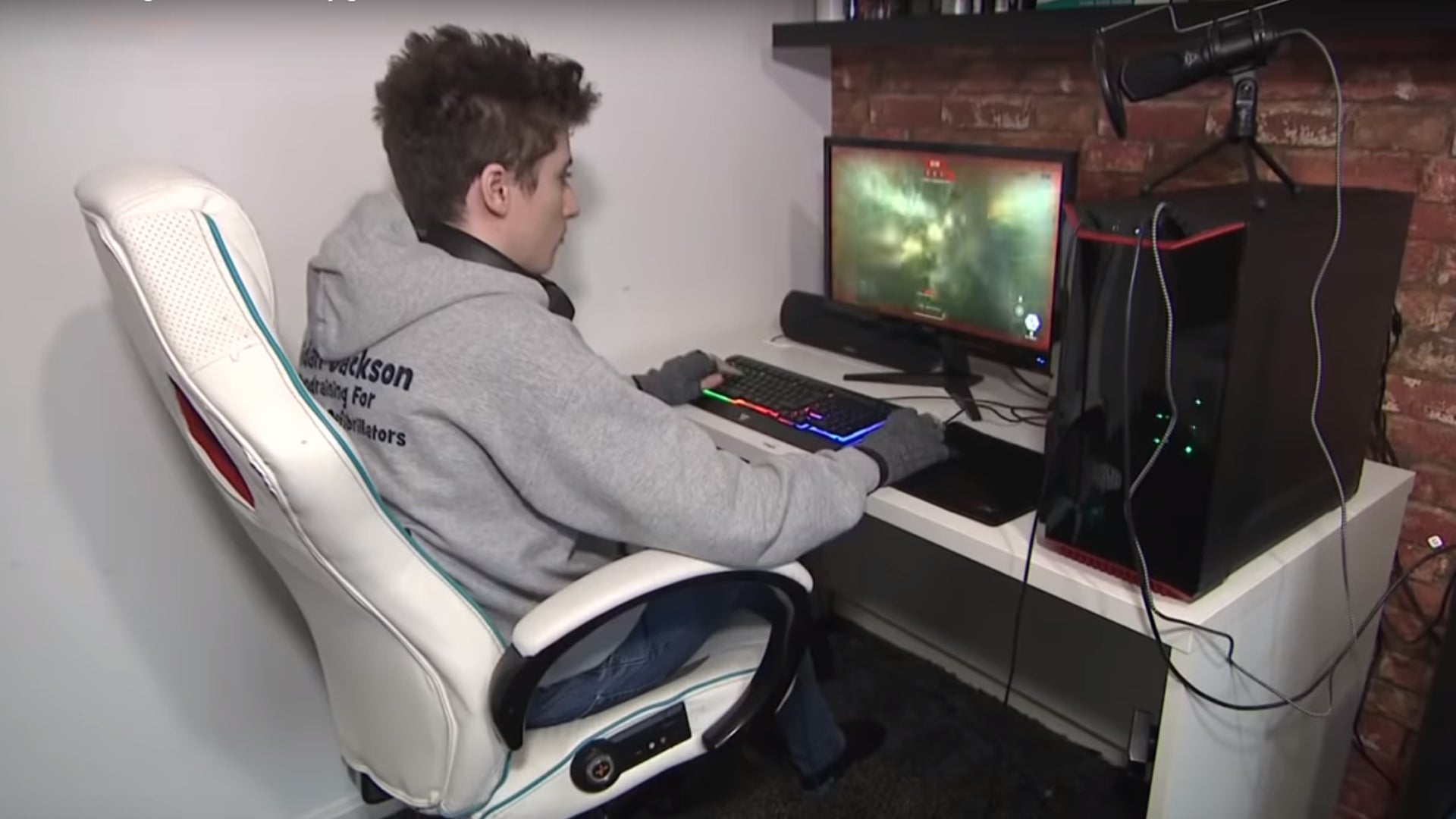 Jackson, 17, playing on his gaming PC. 