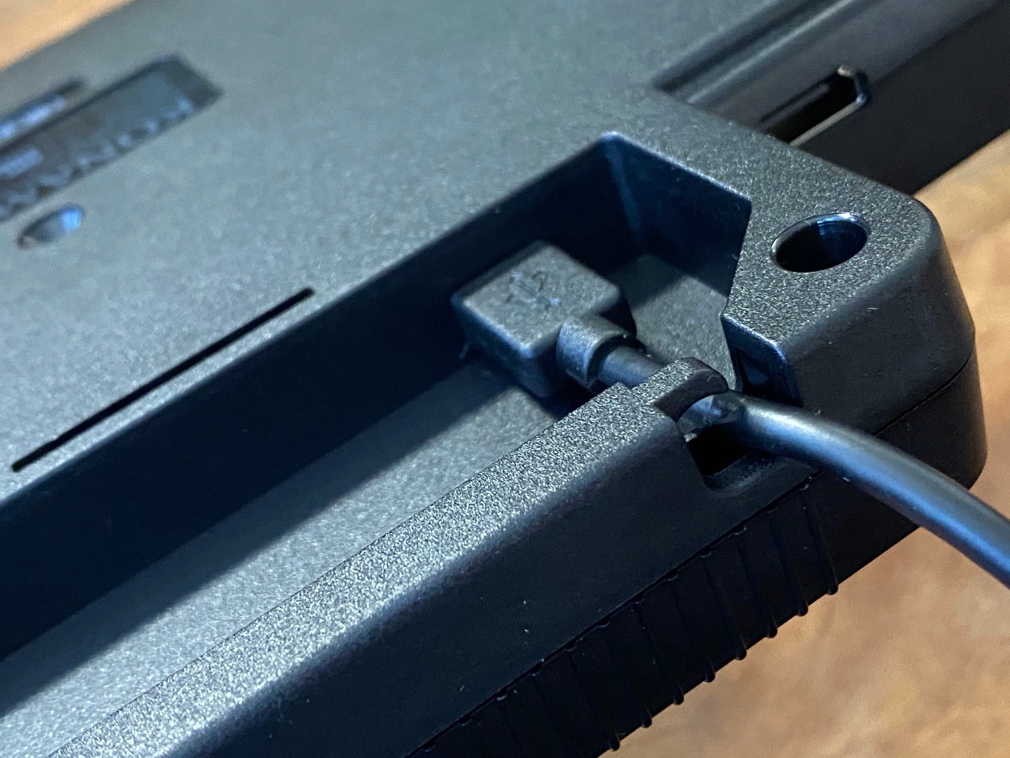 It’s really annoying to jam the USB cable in here, but at least it also gradually destroys the cable every time you do!