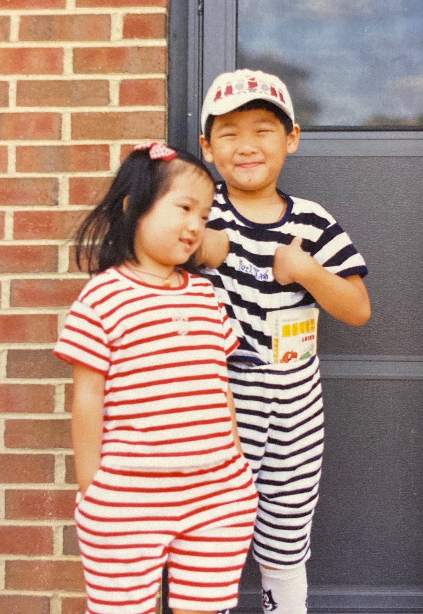 My sister and me. To add my own flavor into my mother-picked, sibling-matched fashion sensibilities, I tried to make “tucking your favorite game’s strategy guide into your waistband” a thing. Needless to say, it did not catch on.