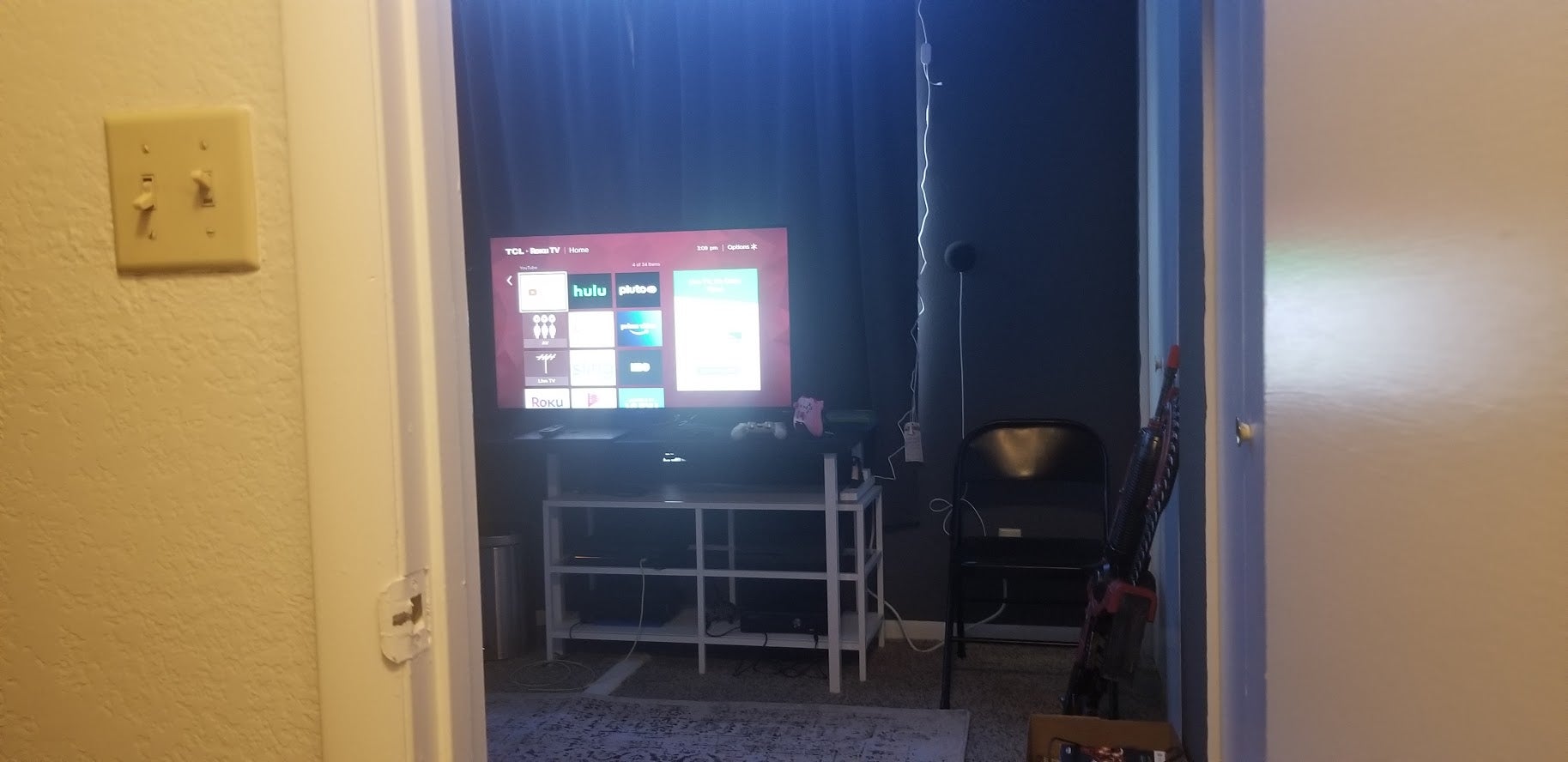 Looking at my TV while sitting on the toilet. (I had pants on.)