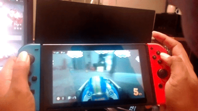 The game in motion on the World 1-1 track.