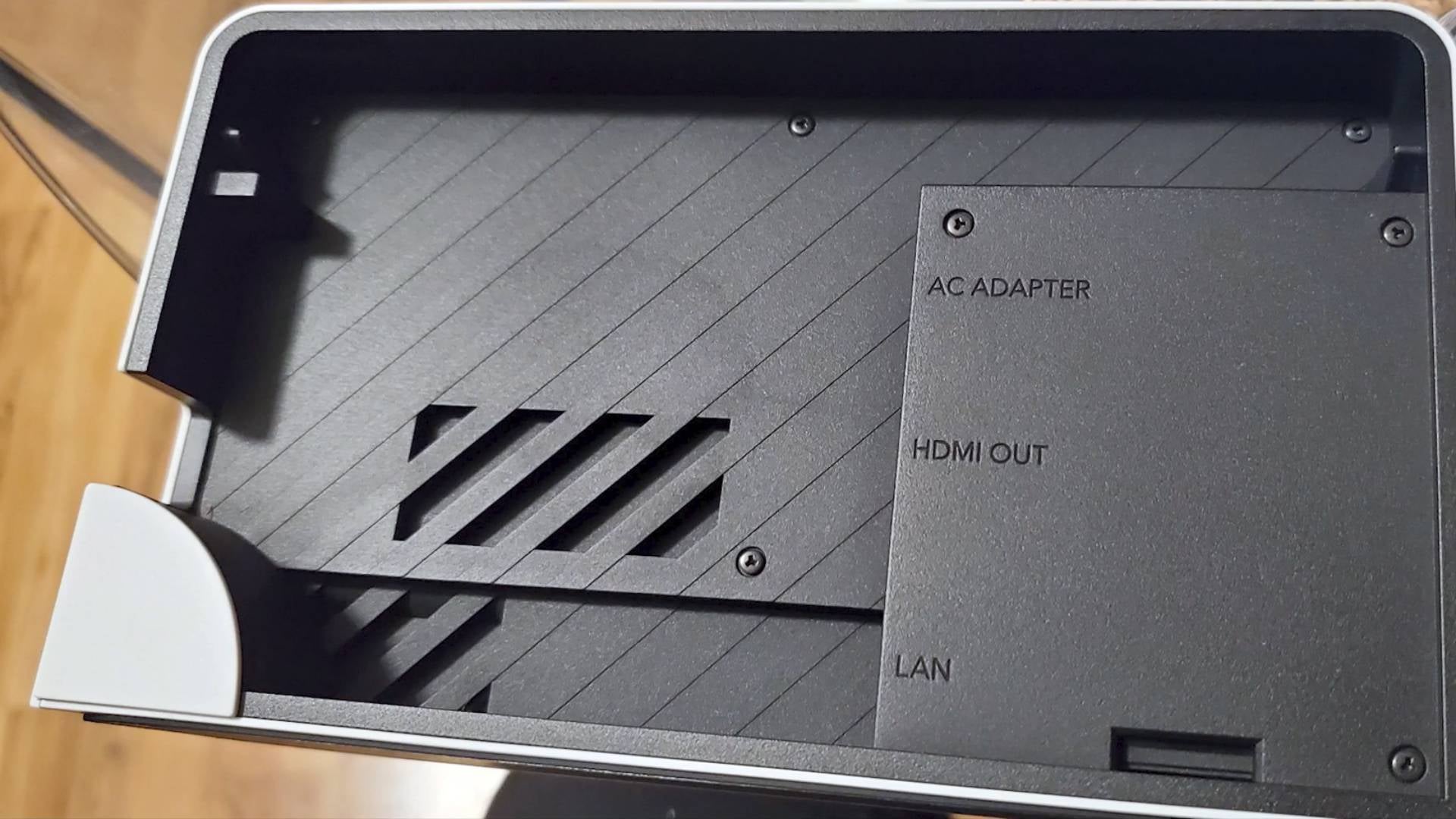 The back of the OLED Model’s dock apparently pops off rather than being on a hinge like with the standard Switch.