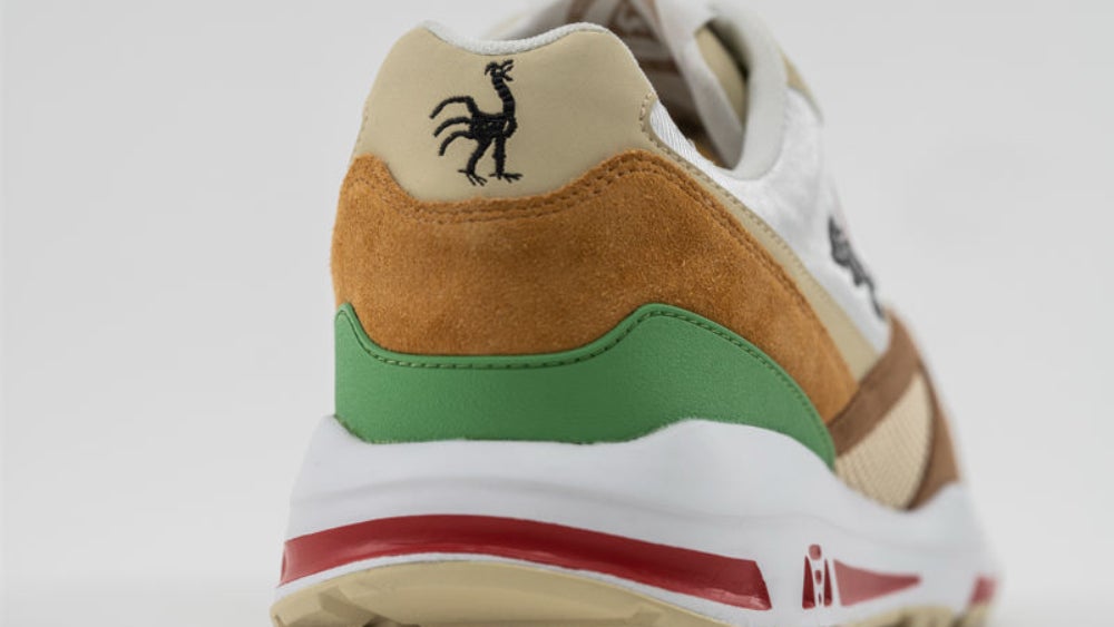 A bone version of the brandās logo.