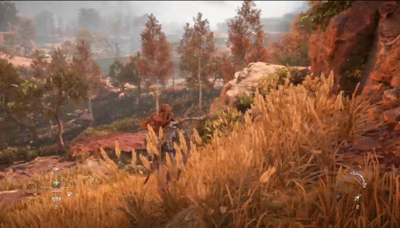 Aloy sliding down a hill on PS4. 