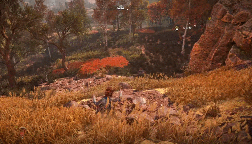 Aloy sliding down a hill on PS5 in performance mode. 