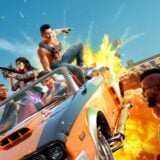 A car explodes as people fire guns.