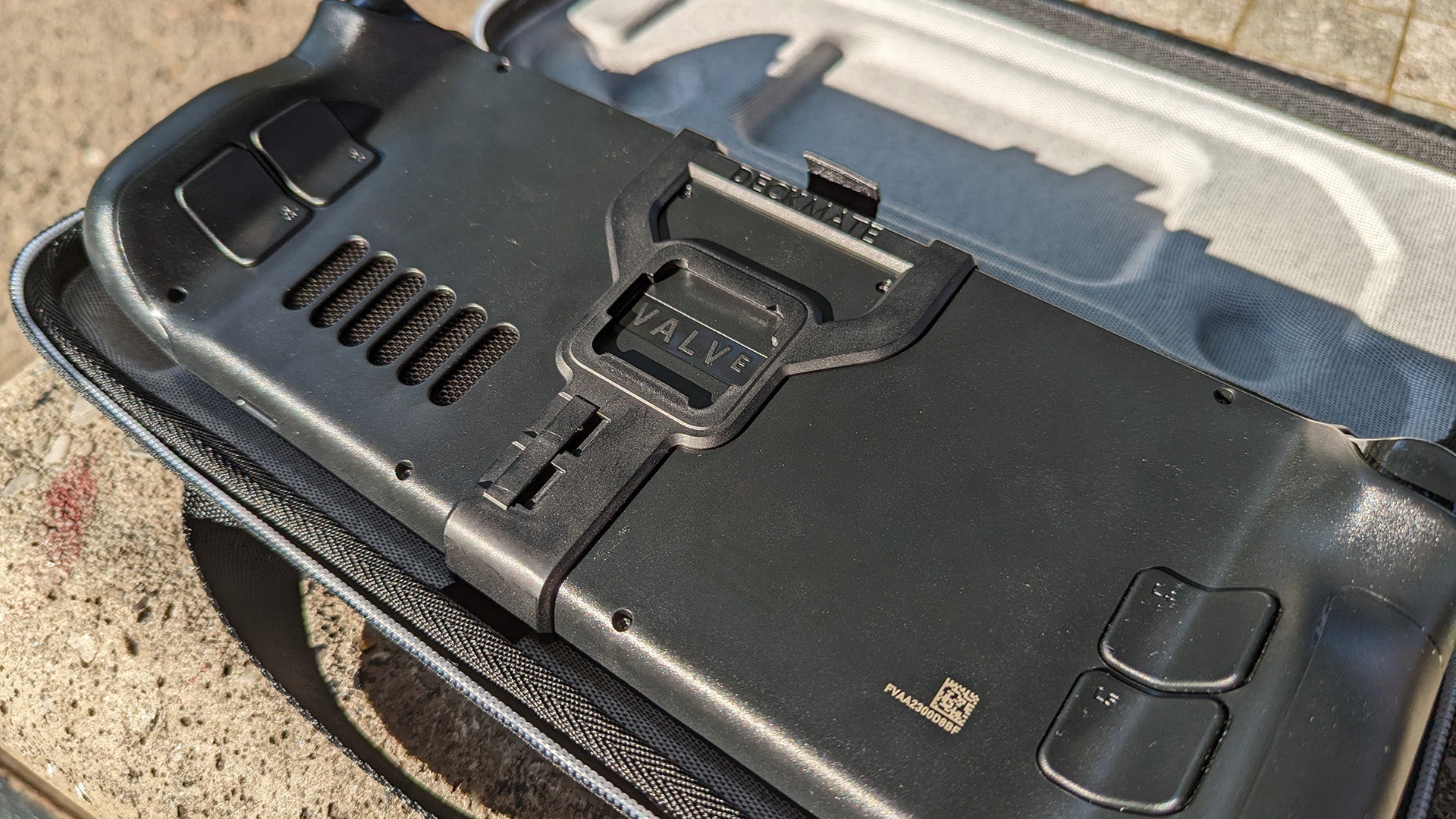 The “grip” bracket snaps on snugly and provides the attachment point for everything else.