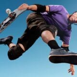 Tony Hawk skates through the air.