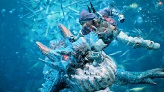A hunter fights under water.