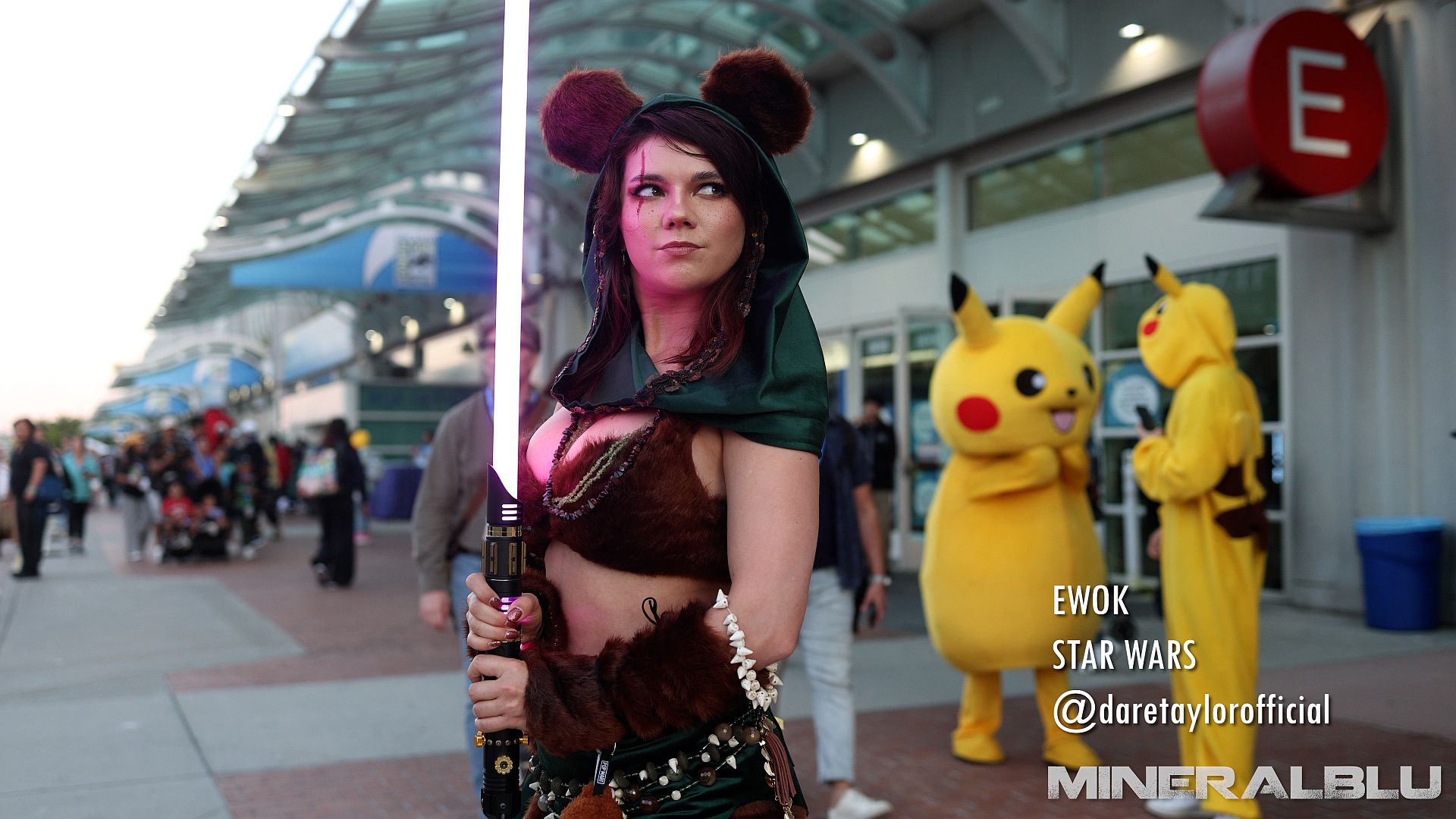 A humanoid Ewok with a light saber.