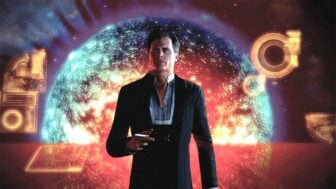 The Illusive Man holds a cigarette.