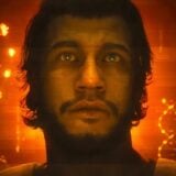 An ex-operative appears inside an orange matrix.