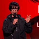 Hideo Kojima talks about his games on stage.