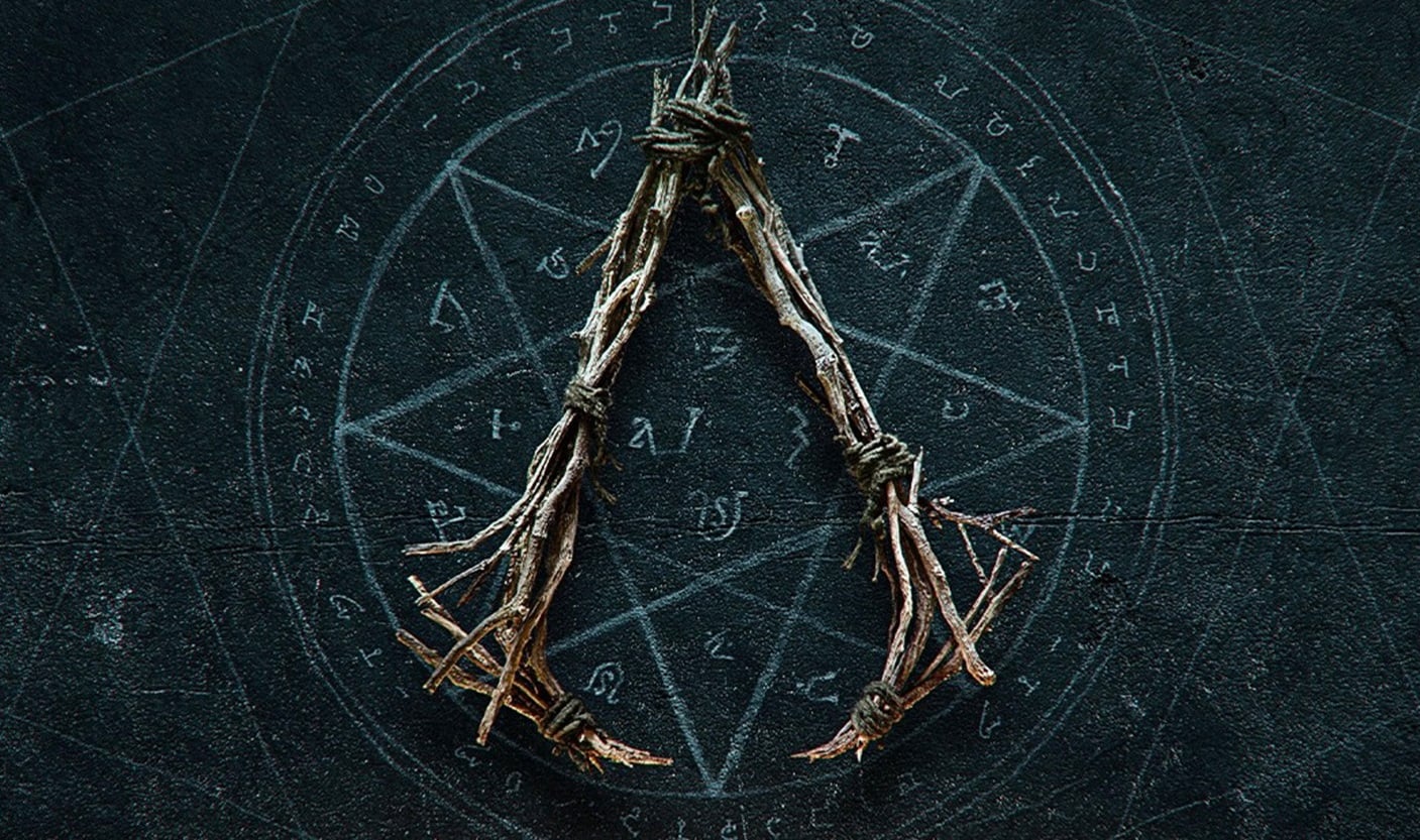 Whicker makes the Assassin's Creed symbol.