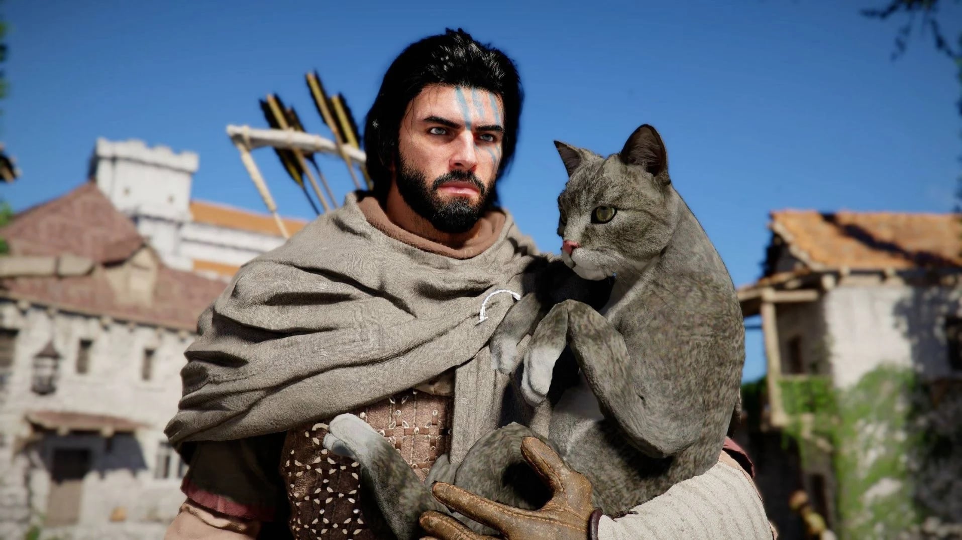 Kliff holds his cat.