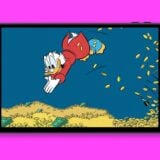 Scrooge swims in gold on a gaming handheld.