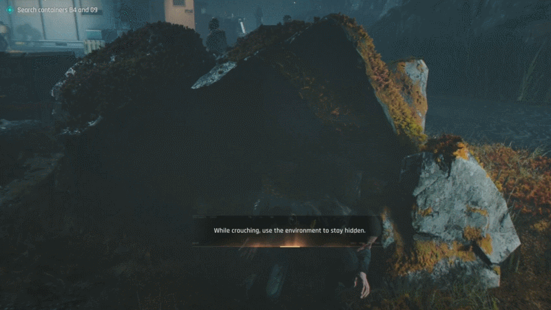 Bond sneaks behind some guys.