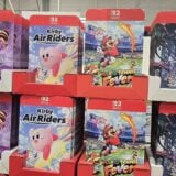 Switch 2 games sit on a rack at Costco.