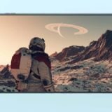 A spaceman appears on a Switch 2 screen.