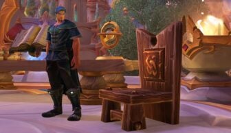 A WoW character looks at a chair.