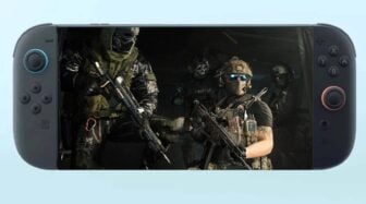 Operators sit in a helicopter.