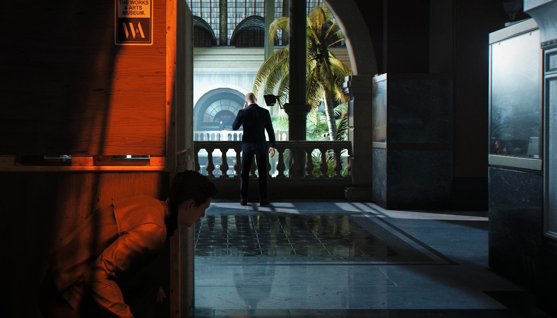 James Bond sneaks behind a corner. 