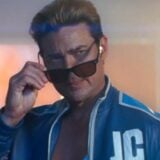 Johnny Cage takes off his sun glasses.