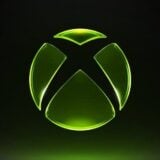 An Xbox logo appears over a dark background.