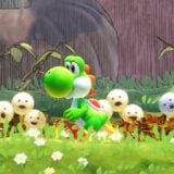 Yoshi walks in a grassy field with flowers.