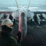 An airman approaches a fighter jet.