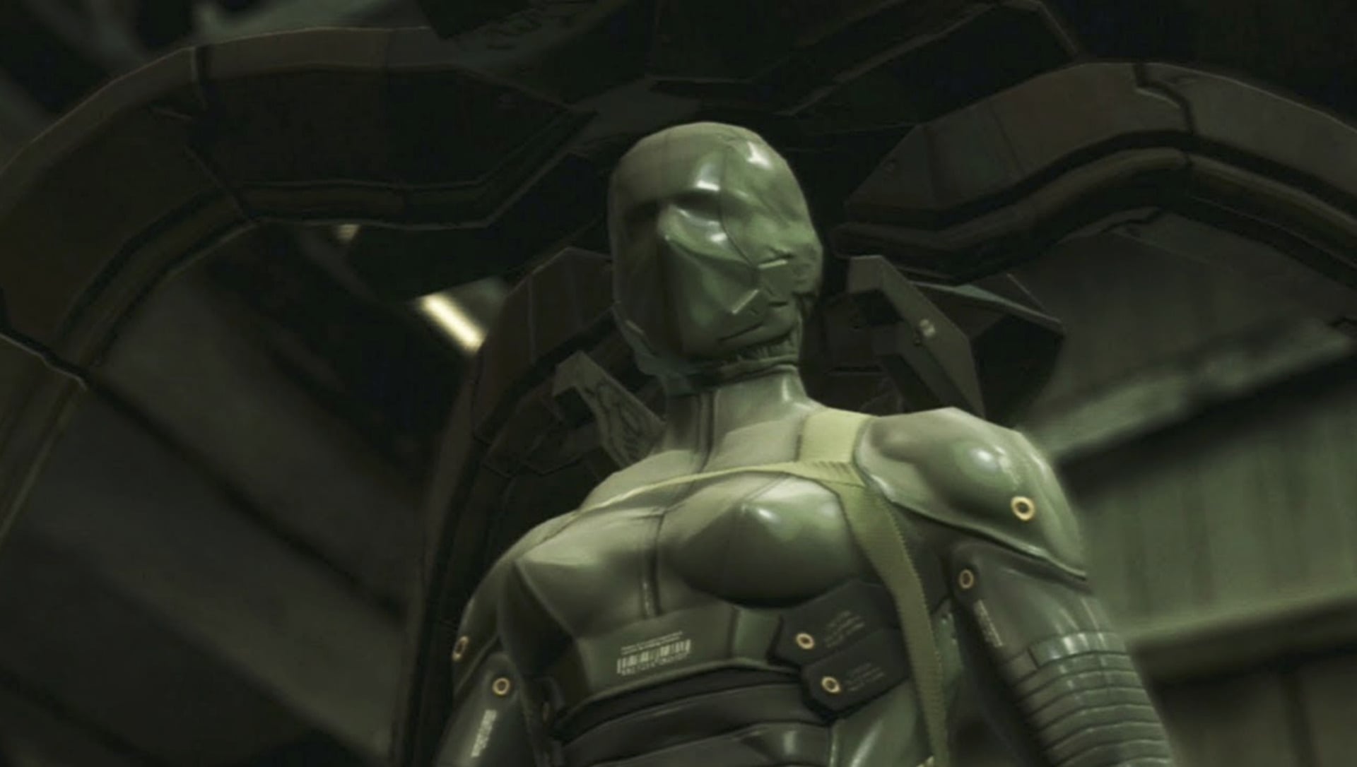 A clothed figure is in a hangar. 