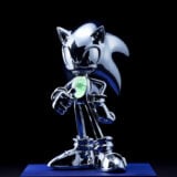 A silver statue of Sonic the Hedgehog containing Sonic's "DNA" encased in a Chaos Emerald