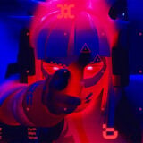 A Vandal holds up her hand in blue and red lighting.