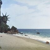 A man sees the Statue of Liberty broken in half.