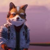 Fox stands in an air hangar.