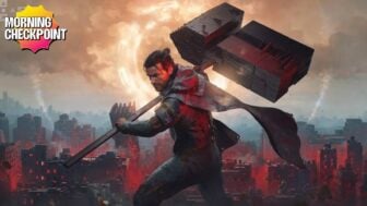 A guy holds a giant hammer.