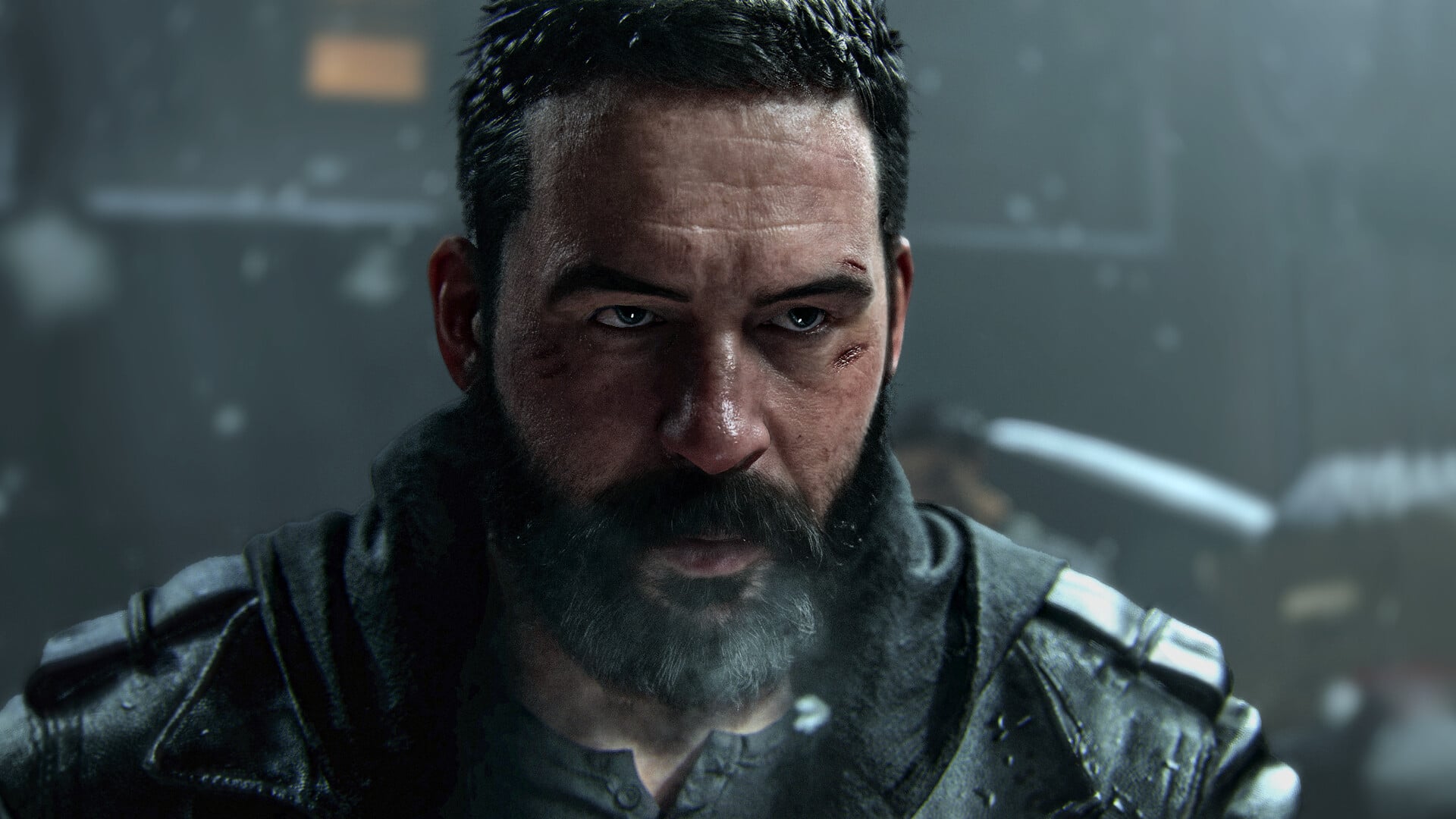 A man looks tired and bloodied from the fight.