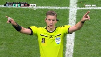 A referee makes the sign for VAR.