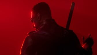 A man prepares to grab a sword to fight vampires.