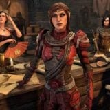 The Elder Scrolls characters sit at a table.
