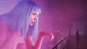 A hologram reaches out to a man.