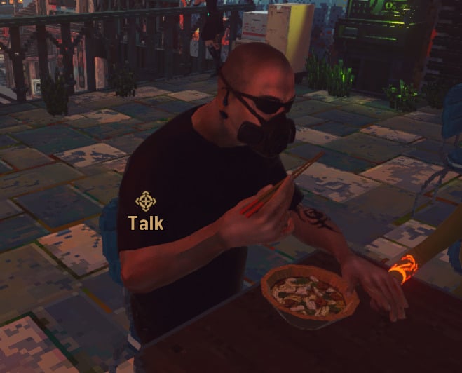 A guy in Nivalis Nights eating despite having a mask on.